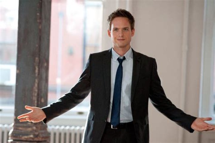 Patrick J. Adams as Mike Ross in Suits: The Definitive Guide
